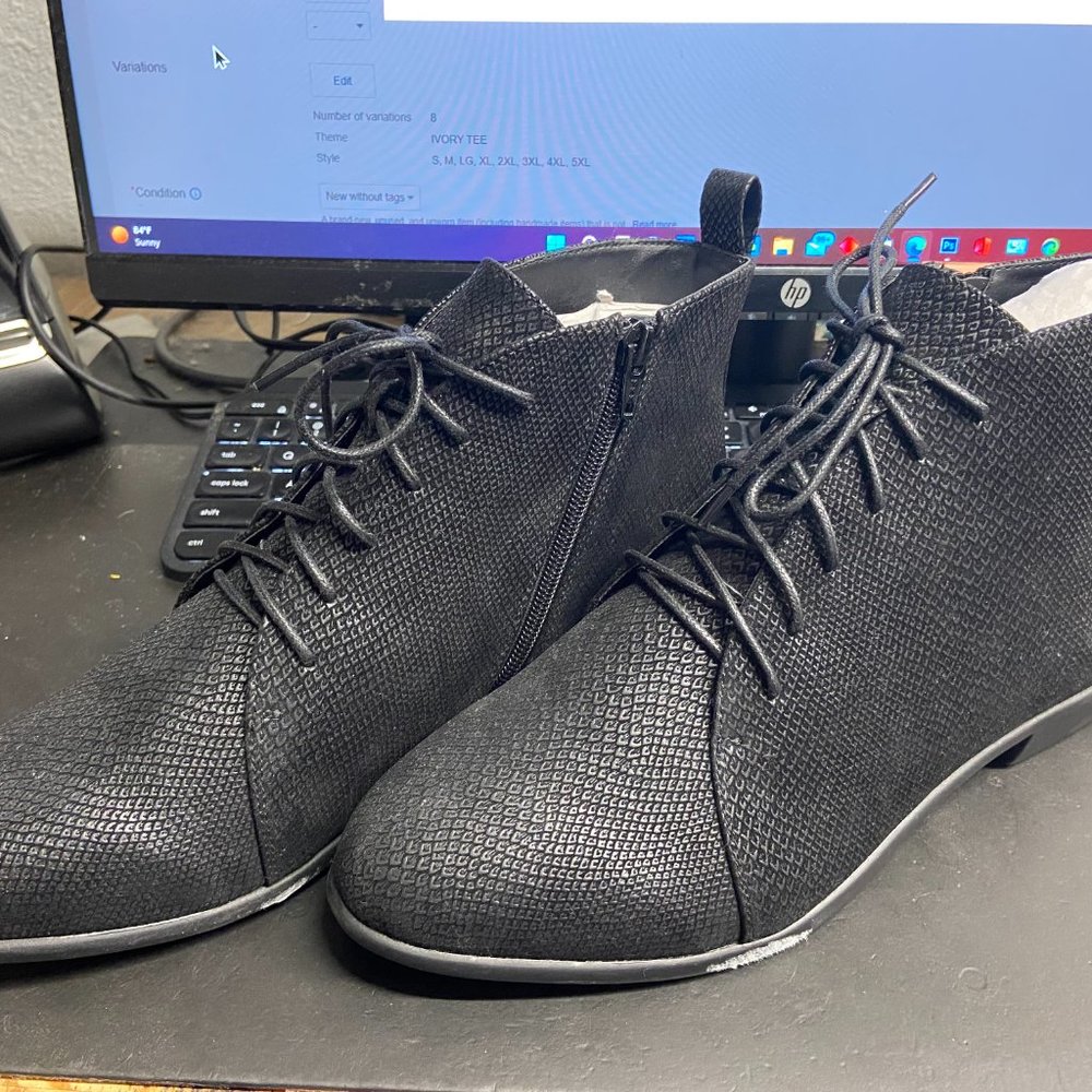 BOOTS, BRAND NEW WOMANS SIZE 11, NO BOX JUST BOOTS VERY CUTE TIE AND ZIP